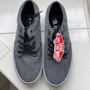 Brand New with Tags Black/white Vans men’s size 9.5